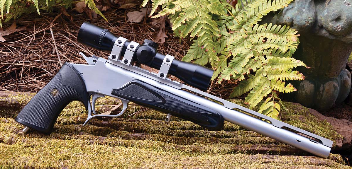 A lack of acid-etched markings on the receiver of Layne’s SSK Industries Contender identifies it as a flatside receiver, as described by collectors of the handgun. In addition to being Mag-Na-Ported to reduce muzzle rise, its 14-inch barrel in 358 JDJ with a 1:12 twist has a precision-machined TSOB scope mounting base extending to its muzzle for added weight.
